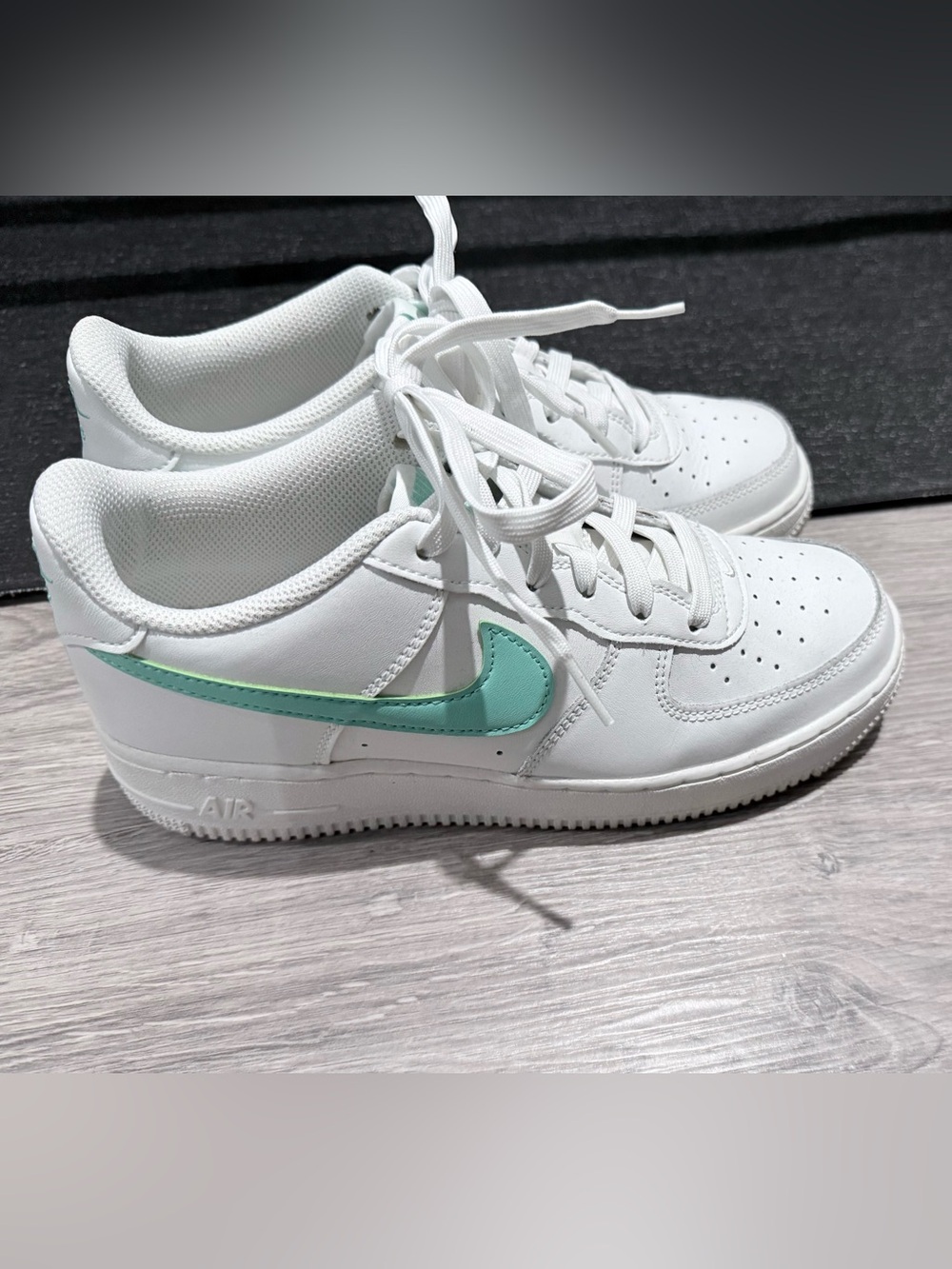 Nike Kids White Sneakers with Teal Swoosh